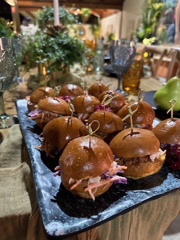 Gourmet mini sliders on toasted buns — Garnishes celebration canapés catering