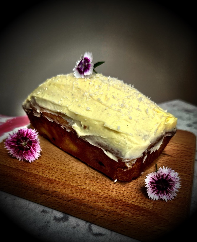 Sliced gluten free bar cake presented on a serving plate — Garnishes working lunch catering